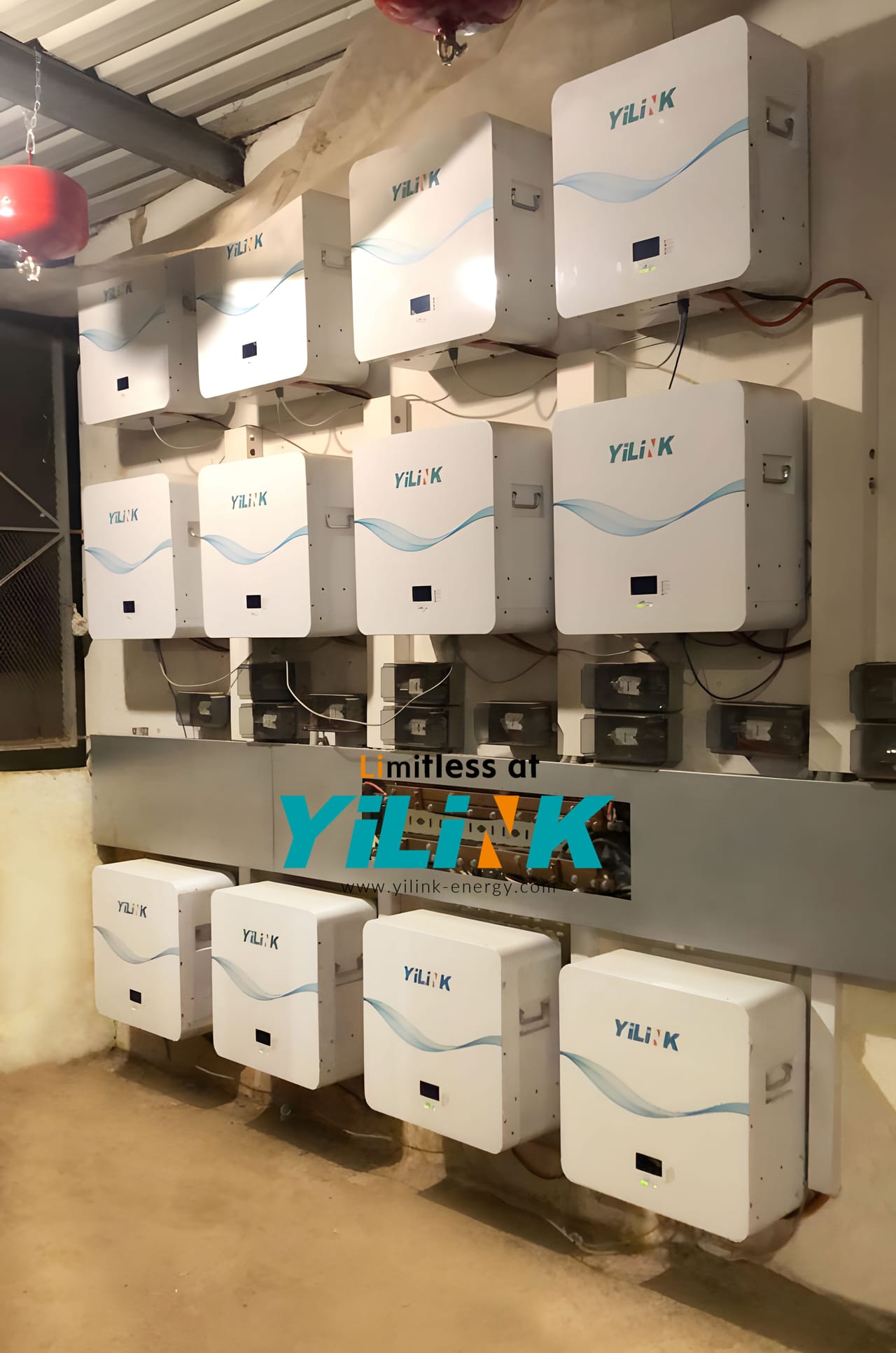 Wall of Yilink iPower Mini batteries in a residential installation